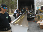 Forming aluminum gutters before installation in Charlotte